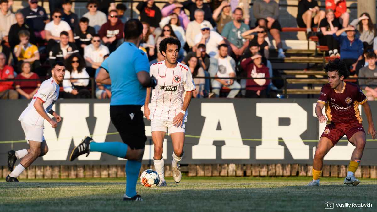 Windsor player on the ball