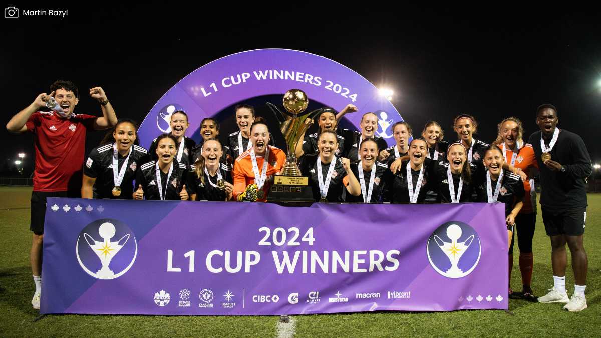 FC london celebrate with trophy