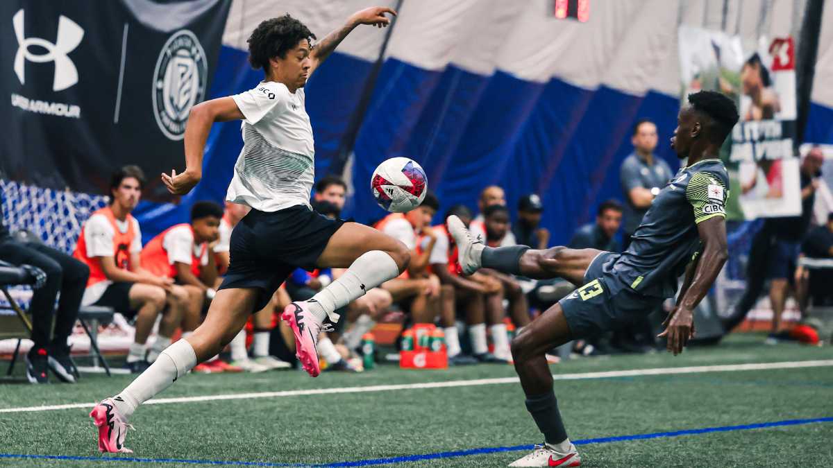 L1ON PHOTO (82) pickering and masters players battling for possession