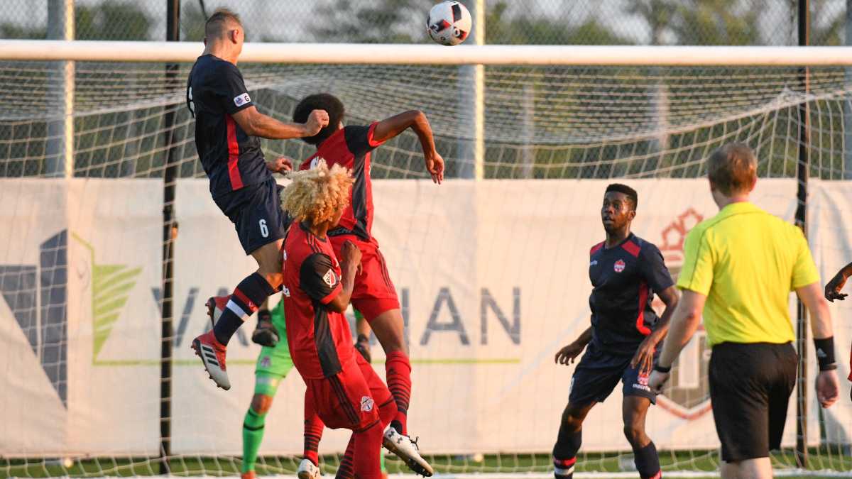 L1ON PHOTO (89) Arnone leaps for a header